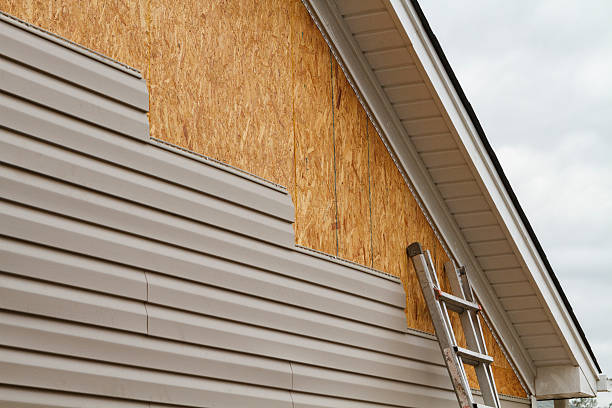 Professional Siding Contractor technician working in Snellville, GA